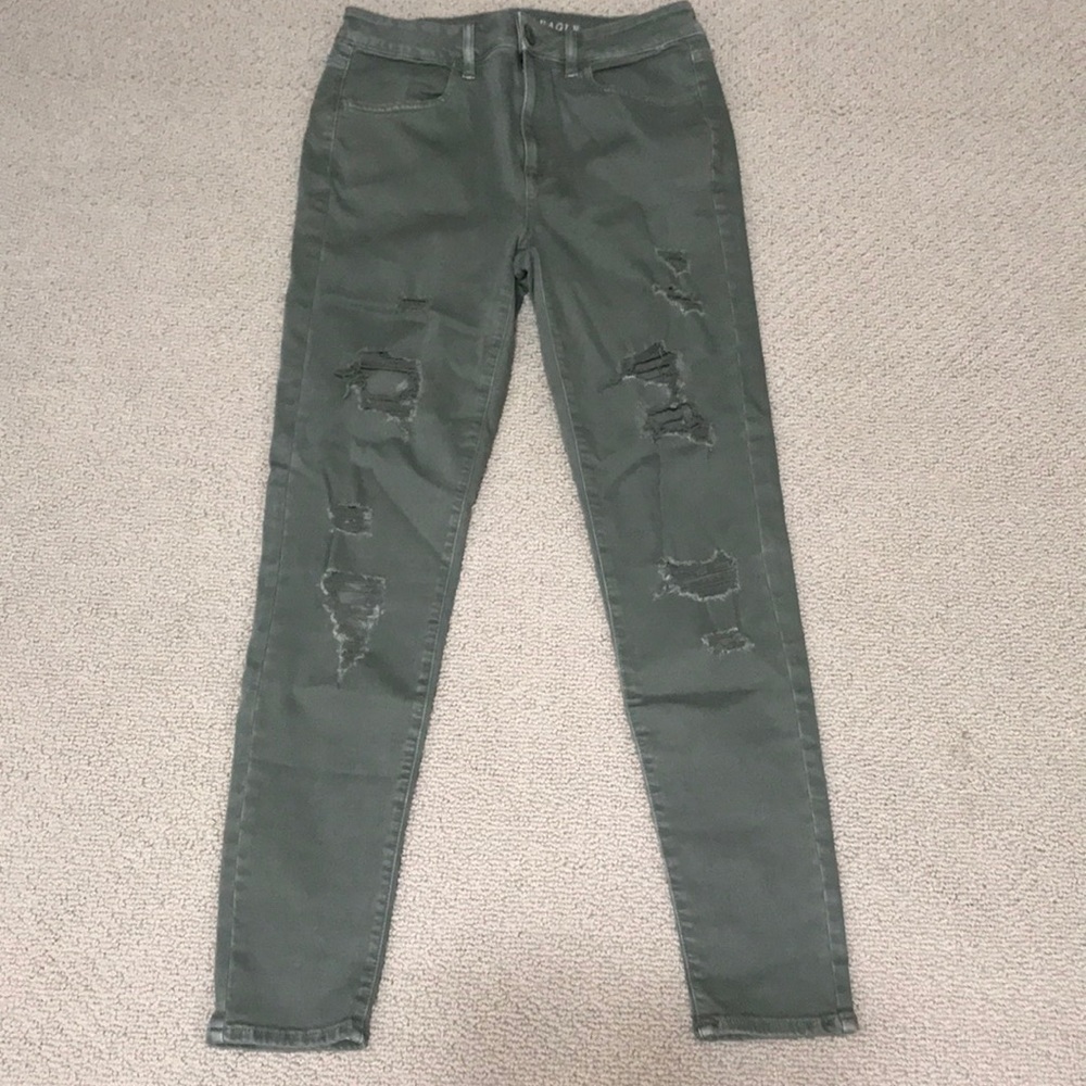 Olive colored ripped jeans